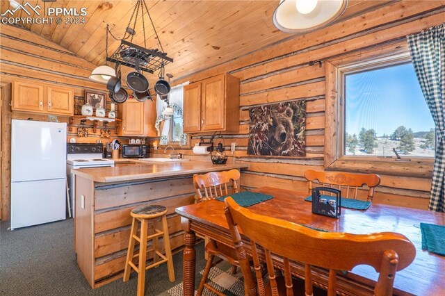 kitchen with white appliances, dark colored carpet, vaulted ceiling, kitchen peninsula, and wood ceiling