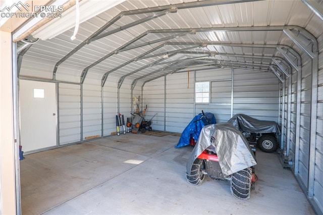 garage with a carport