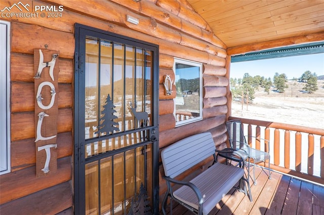 wooden deck featuring covered porch