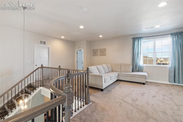 living room featuring light colored carpet