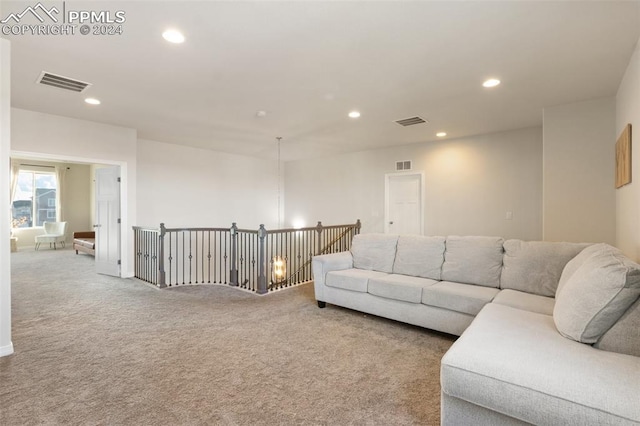 living room featuring light colored carpet