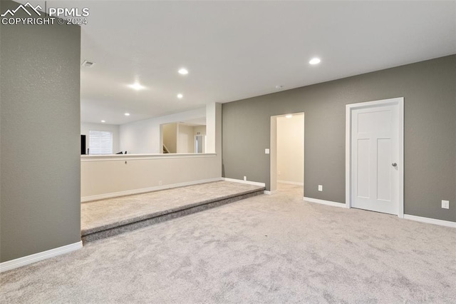 empty room featuring carpet floors