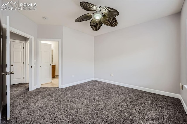 unfurnished bedroom with carpet flooring and ceiling fan