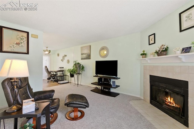 carpeted living room featuring a fireplace