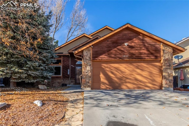 view of front of property featuring a garage