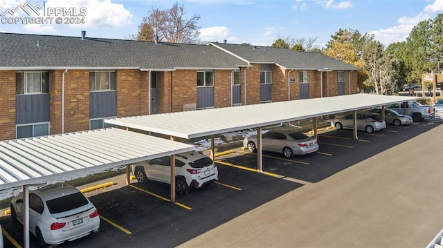 exterior space featuring a carport