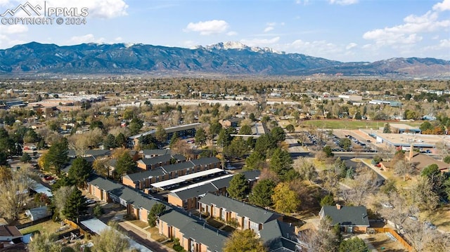 birds eye view of property featuring a mountain view