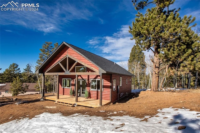 view of front of house featuring a wooden deck