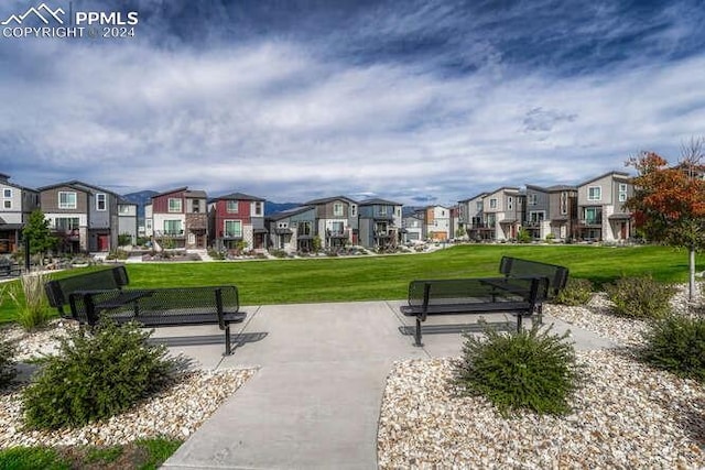 surrounding community with a lawn