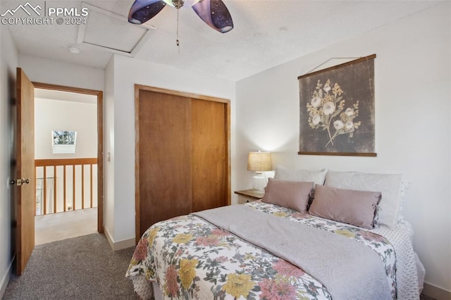 bedroom featuring carpet, a closet, and ceiling fan