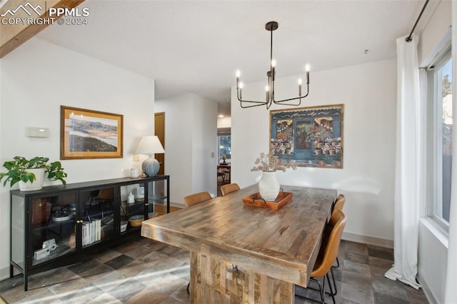 dining room featuring a chandelier