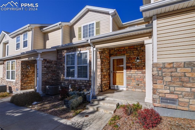 entrance to property with central AC unit