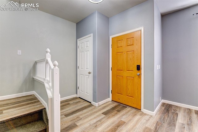 entrance foyer with light hardwood / wood-style floors