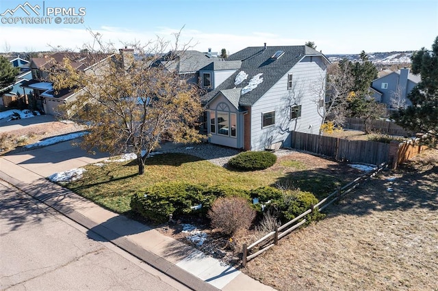 view of front of home with a front yard