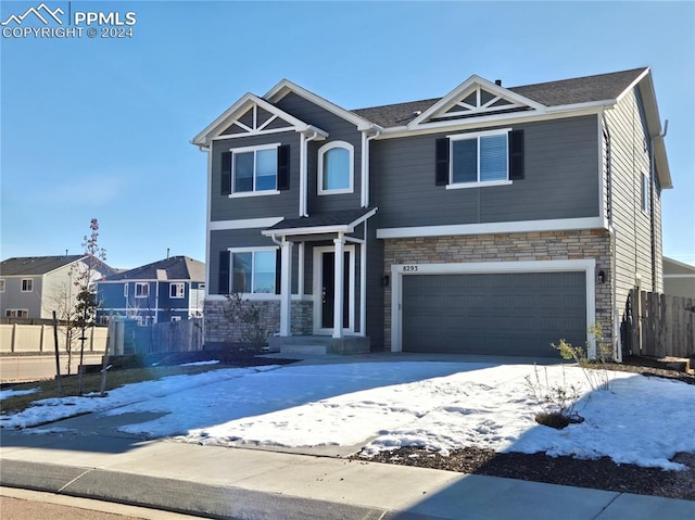 craftsman-style house with a garage