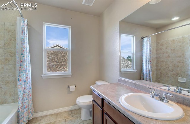 full bathroom featuring shower / tub combo with curtain, vanity, and toilet