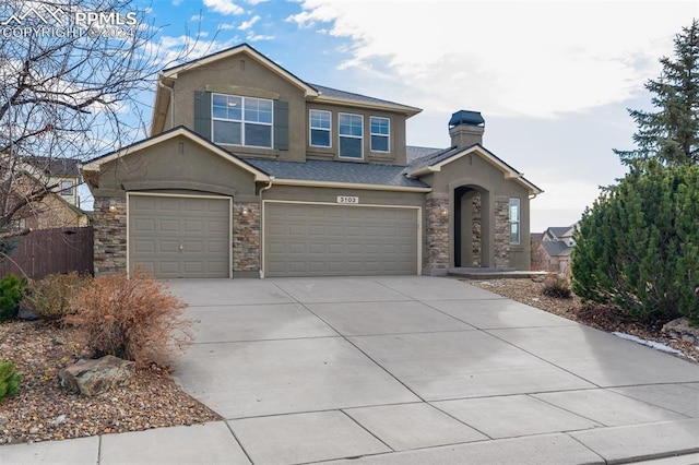 view of front of property with a garage