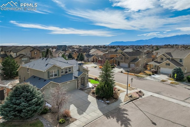 drone / aerial view featuring a mountain view