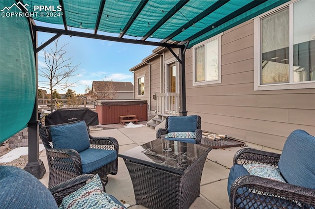 view of patio / terrace featuring a hot tub