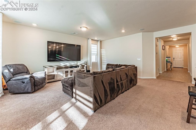 living room featuring light carpet