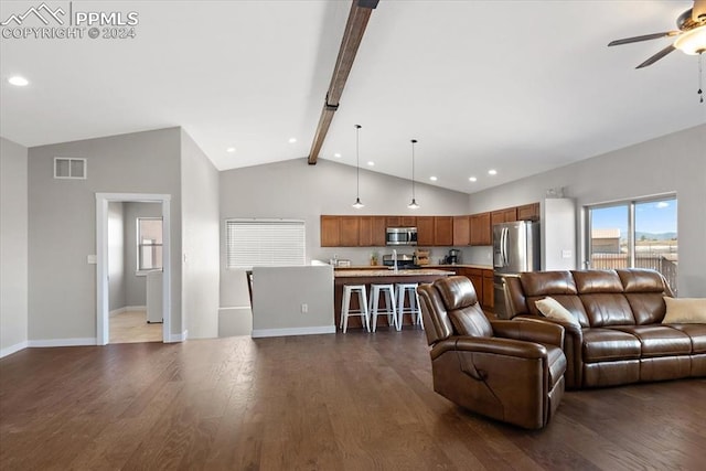 living room featuring ceiling fan, beamed ceiling, dark wood-type flooring, and high vaulted ceiling