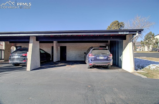 exterior space featuring a carport