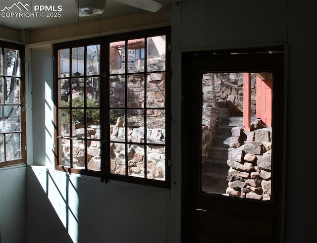 doorway to outside featuring plenty of natural light