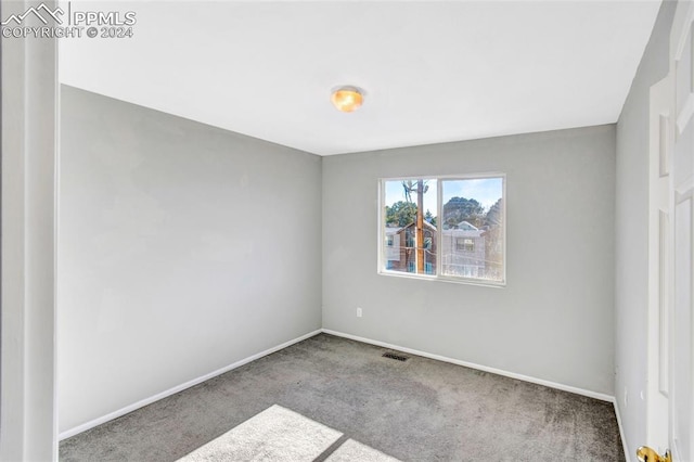 view of carpeted spare room