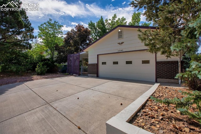 view of home's exterior with a garage