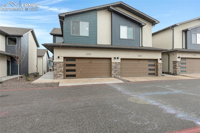 view of front of home with a garage