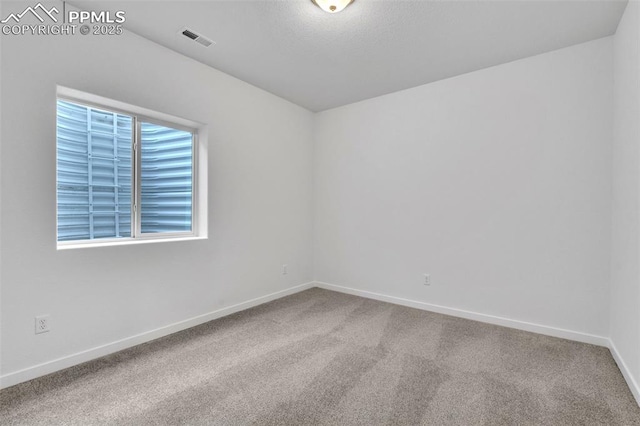 5265 Gansevoort Dr, Colorado Springs, CO 80927 - carpeted spare room with baseboards
