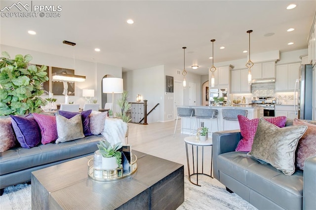 living room with light hardwood / wood-style floors