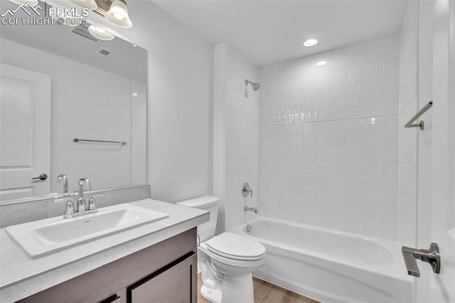5265 Gansevoort Dr, Colorado Springs, CO 80927 - bathroom featuring vanity, bathtub / shower combination, and wood finished floors