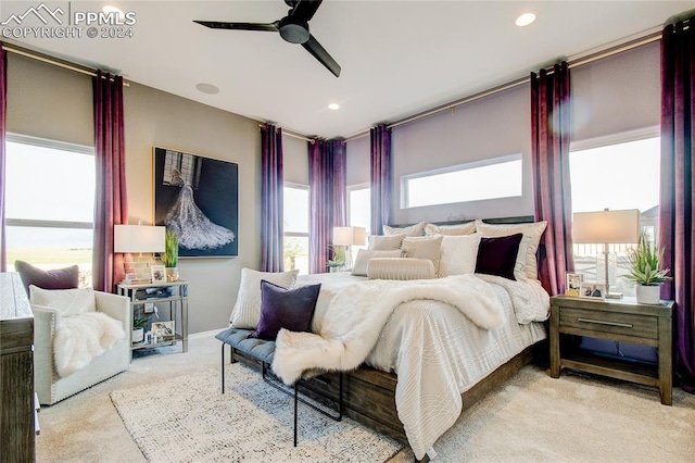 carpeted bedroom with ceiling fan