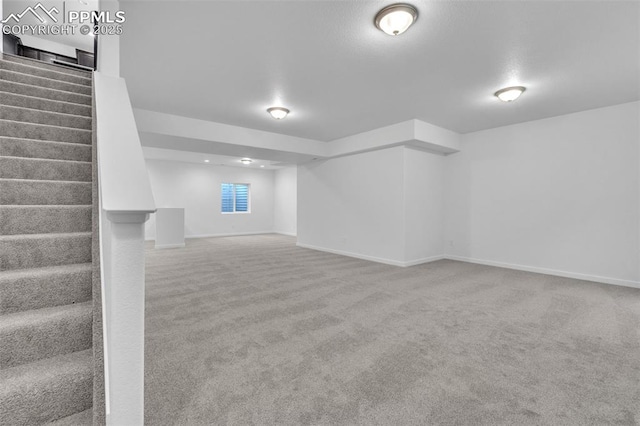5265 Gansevoort Dr, Colorado Springs, CO 80927 - below grade area with stairway and carpet flooring