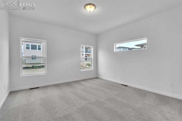 5265 Gansevoort Dr, Colorado Springs, CO 80927 - carpeted empty room featuring baseboards