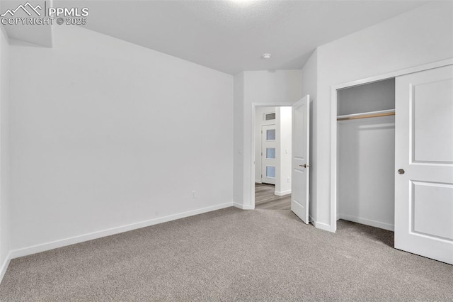 5265 Gansevoort Dr, Colorado Springs, CO 80927 - unfurnished bedroom with carpet floors and a closet