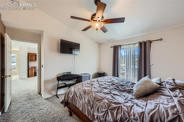 carpeted bedroom featuring ceiling fan and lofted ceiling