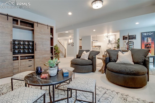 living room featuring a barn door