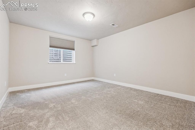 view of carpeted empty room