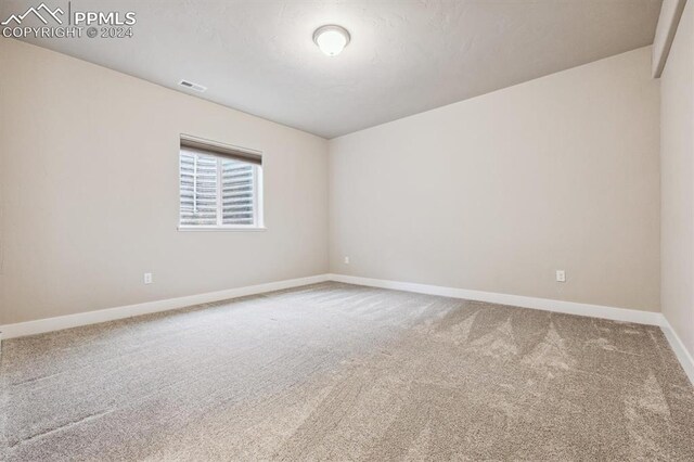 7680 Almond Wood Loop, Colorado Springs, CO 80908 - carpeted spare room with baseboards