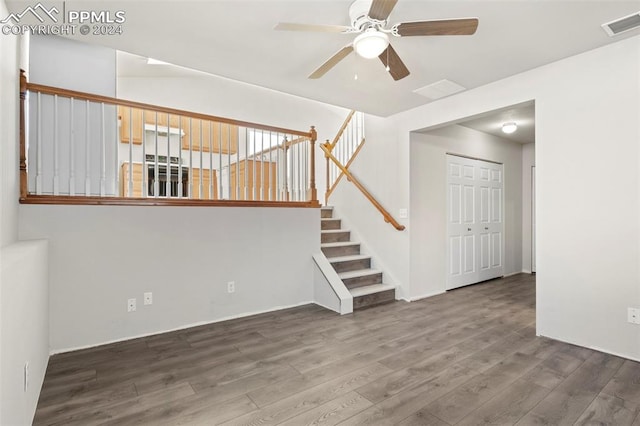 empty room featuring ceiling fan and wood-type flooring