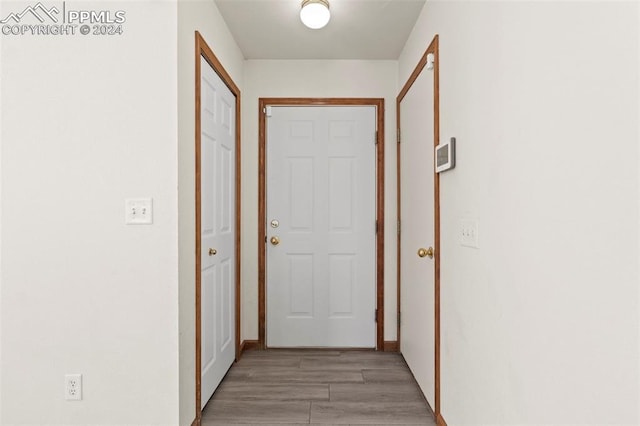 corridor featuring light hardwood / wood-style flooring