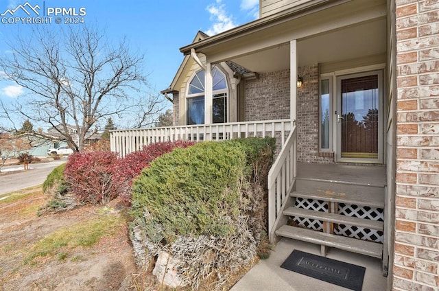 entrance to property with covered porch