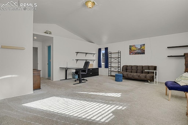 carpeted living room featuring vaulted ceiling