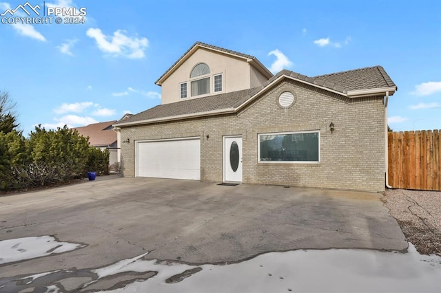 front of property featuring a garage