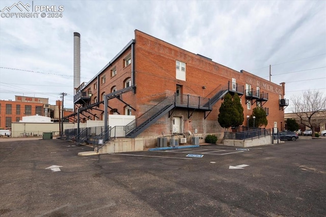 view of building exterior featuring central AC unit