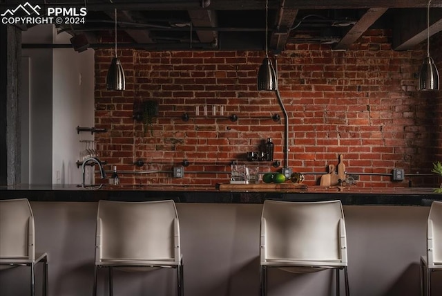 bar featuring brick wall