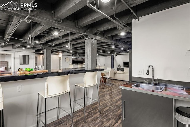 kitchen with dark hardwood / wood-style floors and sink