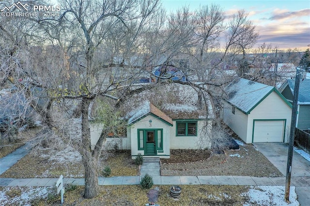 view of front of property with a garage